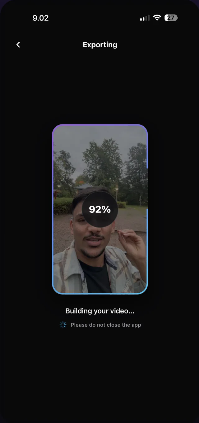 Exporting screen: Building your video, 92 percent complete, rendered on the phone